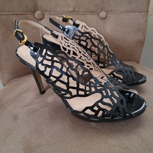 Le Chateau Luxe, black laser cut heels.